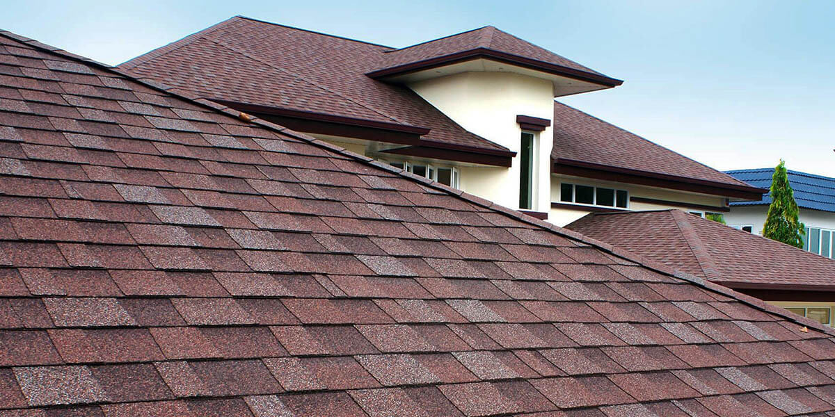 4 Ways To Keep Roof Replacement Costs Down - Happy Roofing Featured Image